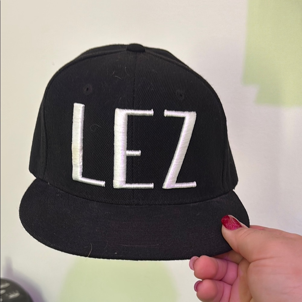 Black Cap with White Lettering